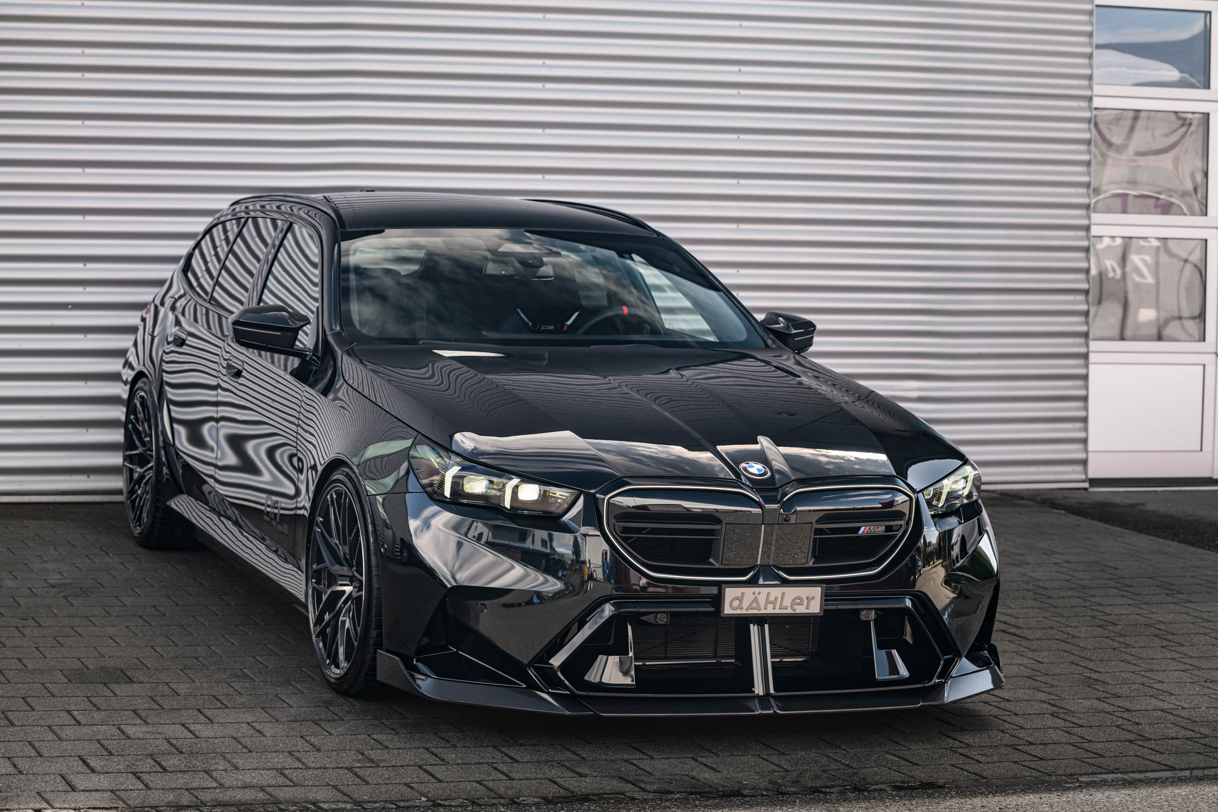 BMW M5 G99 Touring Wagon engine tuning exhaust system forged wheels carbon front lip valve controller attc anti theft gas pedal commander